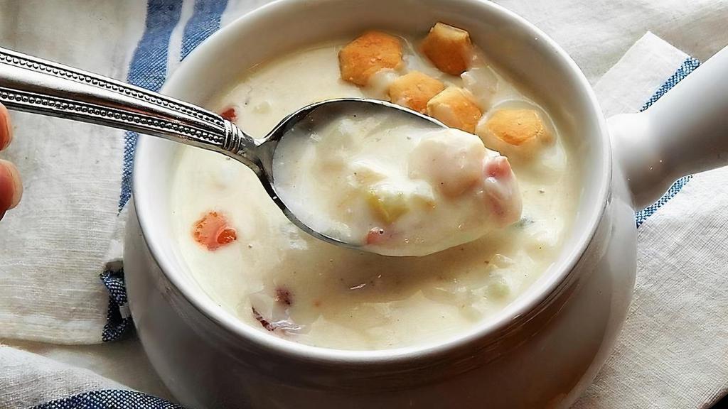 Clam Chowder · A thick homemade chowder with clams, potatoes, onions, and cream.