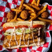 Fish Po Boy · Classic Louisiana Po Boy Sandwich with fried U.S.A Catfish, shredded lettuce, tomato and hom...