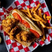 Oyster Po Boy · Classic Louisiana Po Boy Sandwich with fried Oyster, shredded lettuce, tomato and homemade a...