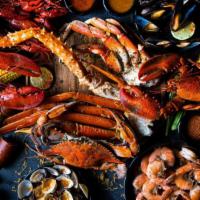 Seafood Family Feast · ALL OF OUR SEAFOOD: 2 Whole Lobsters, 1 King Crab Leg, 1 Dungeness Crab, 1 Cluster of Snow C...