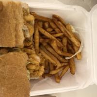 Fried Catfish Po-Boy (Small) · All Po'-boys dressed with lettuce, tomatoes, pickles, and mayonnaise. Add Fries & Drink for ...