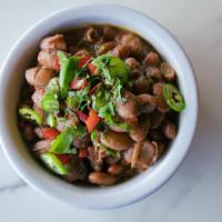 Borracho Beans · Cooked up with bacon, onion & garlic &. simmered in beer for big cowboy flavors.