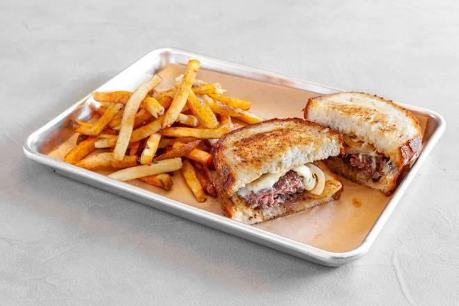 Patty Melt · A diner staple. Seasoned 1/3 lb. 100% beef patty topped with melted white American cheese and sautéed onions, then slathered with our 1000 island dressing between two slices of toasted Macrina sourdough bread. Served with fries.
