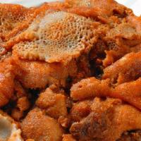 Breakfast Kwanta Firfir · Dried beef is cooked with tomatoes, red peppers seasoning, injera, and spiced butter.