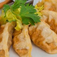 Deep Fried Gyoza · Eight pieces of Deep-fried shrimp dumpling.