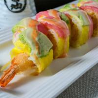 Phoenix Roll · Shrimp tempura, mango, KING CRAB inside of sushi roll with soy wrapper,top with  tuna and av...