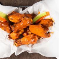 Chicken Wings · Bone-in or boneless wings hand tossed in your choice of sauce. Served with celery, carrot st...