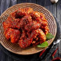 Red Hot Pepper Chicken · Spicy. Crispy and tender chicken tossed in our addictive gochujang sauce