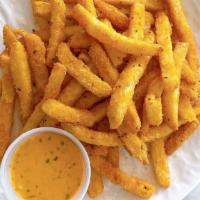 Cheese Monster Fries · French fries coated with cheese powder served with our special cheese sauce.