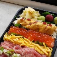 Chirashi · 10 pcs  sashimi and pickle over sushi rice.