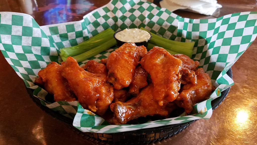 Wings O'Malley · Crisp fried, juicy bone-in chicken wings or breaded boneless chicken tossed in your choice of Asian, dragon, angry or kilt lifter habañero sauce. Served with celery and ranch or bleu cheese dressing.
