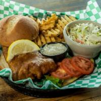 Fibber'S Fish Sandwich · Golden fried ale battered cod served on a bun with lettuce and tomato. Accompanied by waffle...