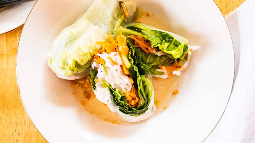 Fresh Spring Rolls (2 Pieces) · Rice noodles and vegetables wrapped in rice paper. Served with our house sweet and sour, topped with crushed peanuts.