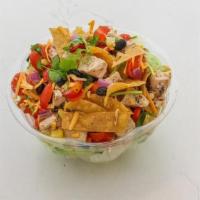 Tex-Mex · Romaine, Grilled Chicken, Tomato, Corn, Black Bean, Red Onion, Cilantro, Tortilla Strips, an...