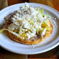  Sope · Deep fried corn masa, topped with refried beans, lettuce, fresco cheese and meat of your cho...