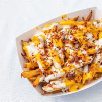 Bacon Cheddar Ranch Fries · Hand Cut Fresh Boardwalk Fries w Cheese Sauce, Buttermilk Ranch Topped w Bacon Pieces