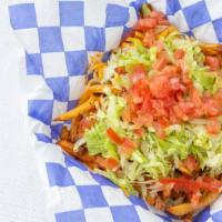 Taco Fries · Fries served with our homemade beef chili, taco seasoning, lettuce, tomato, raw onion, and s...