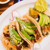 Grilled Fish Taco (3 Pcs) · Topped with pico de gallo, avocado, and cotija cheese. Tacos topped with fresh onions and ci...