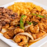 Camaron A La Mexicana · Grilled marinated Shrimp with sautéed onions, tomato and jalapeño peppers, accompanied with ...