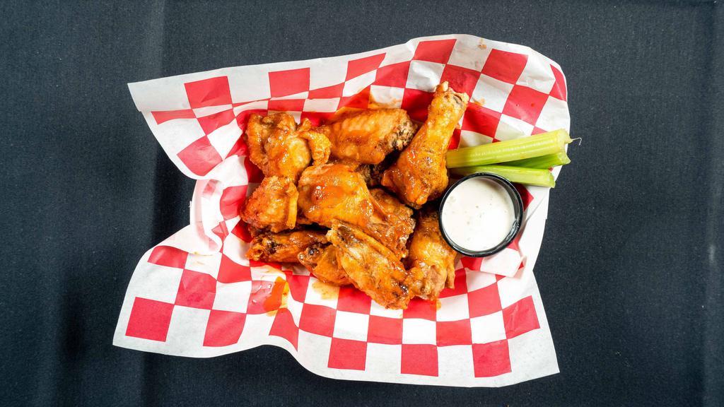 Martini'S Style Wings · Large chicken wings fried unbreaded, tossed in your choice of buttery hot buffalo sauce, bbq sauce, or mango habenaro, served with celery sticks, blue cheese & Ranch.
