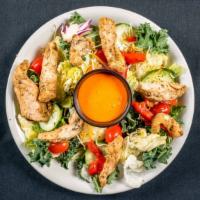 Grilled Chicken Salad · Tender grilled chicken breast, fresh mixed salad greens, carrots, tomatoes, onions, peppers,...