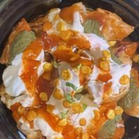 Momo Chaat Vegetable Or Chicken · Nepalese dish. Crispy fried dumplings topped with soybean sauce, yogurt tangy tamarind and m...