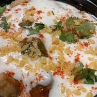 Delhi Dahi Bhalla Chaat · Indian dish. Lentil fritters topped with yogurt tangy tamarind and mint chutney.