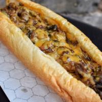 Cheesesteak Sandwich · Cheesesteak sandwich with thinly sliced USDA Texas Beef seasoned to perfection. Served on a ...