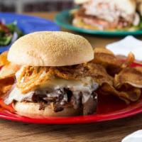 The Mixon · Award winning house-smoked beef brisket piled high, topped w/swiss cheese, crispy shoestring...