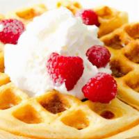 Traditional Waffle Breakfast · Two waffles w/choice of bacon, sausage or scrapple.