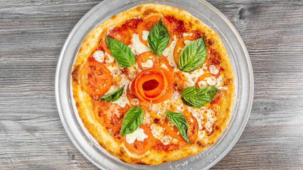 Margherita Pizza · Fresh Mozzarella, tomato, and basil.