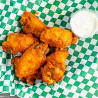 Wings · Naked bone-in wings served with a side of  ranch or blue cheese.
1 sauce per 6 wings
