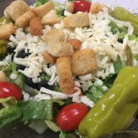 Garden Salad · Romaine lettuce, olives, tomato, cheese, shredded carrots, red cabbage, and croutons. Small ...