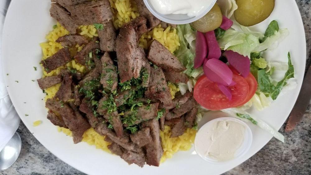 Lamb Shawerma Entree · Served with garlic sauce & your choice of side.