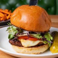 Madison Square Garden · Chargrilled Beyond Burger topped with muenster cheese, garden mix, tomato, and Texas pecan h...