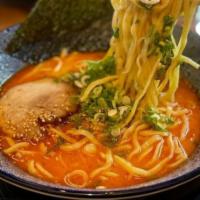 Classic Spicy Miso Ramen · Wheat noodle in spicy dashi, miso & chicken broth topped with chashu pork, green onions & no...