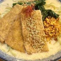 Classic Creamy · Vegan. Spinach noodle in mushroom dashi and soy milk topped with inari (fried sweet tofu), k...