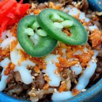Cheese Gyudon · Steamed rice topped with simmered beef (sukiyaki beef), mozzarella cheese, sesame seed, tabe...