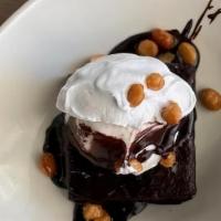 Brownie Sundae* · Warm chocolate brownie with vanilla ice cream, coconut cream, peanuts, and hot fudge (contai...