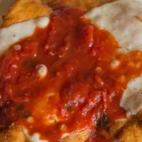 Chicken Parmigiana No Pasta · Thin, Breaded, fried White Breast Meat topped with Mozzarella and Tomato Sauce (no pasta).