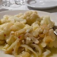 Cauliflower · Vegan, vegetarian, and gluten-free. Steamed with Onions and Olive Oil