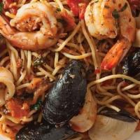 Shell Fish Platter With Linguini · Highest Quality Jumbo Shrimp,  Clams, Mussels and Calamari over spaghetti in either (red) ma...