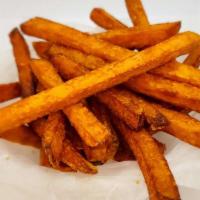Sweet Potato Fries · Seasoned crispy coated sweet potato fries.