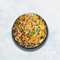 Vegetable Biryani · Long grain basmati rice cooked with farm-fresh vegetables and aromatic Indian herbs. Served ...