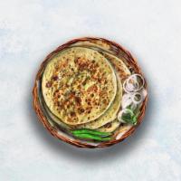 Paneer Kulcha · Indian white flour mildly leavened flatbread loaded with fresh cottage cheese and baked to p...
