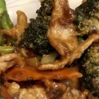 Szechuan Chicken · Spicy. Sliced chicken sautéed with carrots, onion and green peppers.
