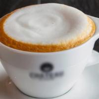 Cappuccino · Composed of a single espresso shot and steamed milk, topped with a golden ring of foamed milk.
