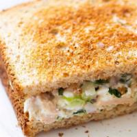 West Coast Tuna Sandwich · Tuna salad, swiss, sprouts, avocado, tomato on whole wheat.