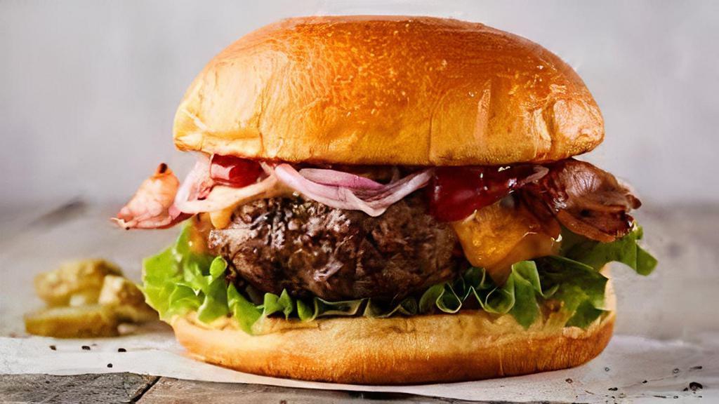 Angus Beef Hamburger · Lettuce, tomato, and mayonnaise. Includes Chips
