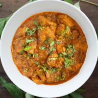 Chicken Curry Meal · Made from boneless and skinless chicken thighs cooked in onion, ginger, garlic, and tomato-b...